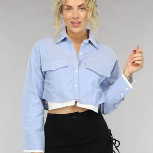 NEW0805 Lichtblauwe Korte Blouse met Uitstekende Zakken