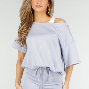NEW180326 Lichtblauwe One Shoulder Top met Ingewerkte Top