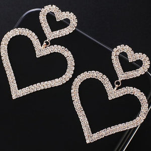 TERUG Gouden Hartjes Oorbellen