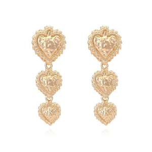 TERUG Goudkleurige Hartjes Oorbellen