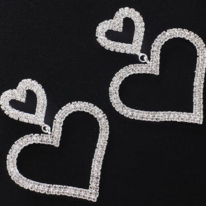 TERUG Zilveren Hartjes Oorbellen