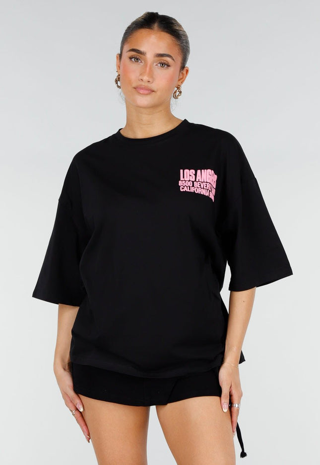 NEW290426 Zwart Oversized T-shirt met Roze Tekst