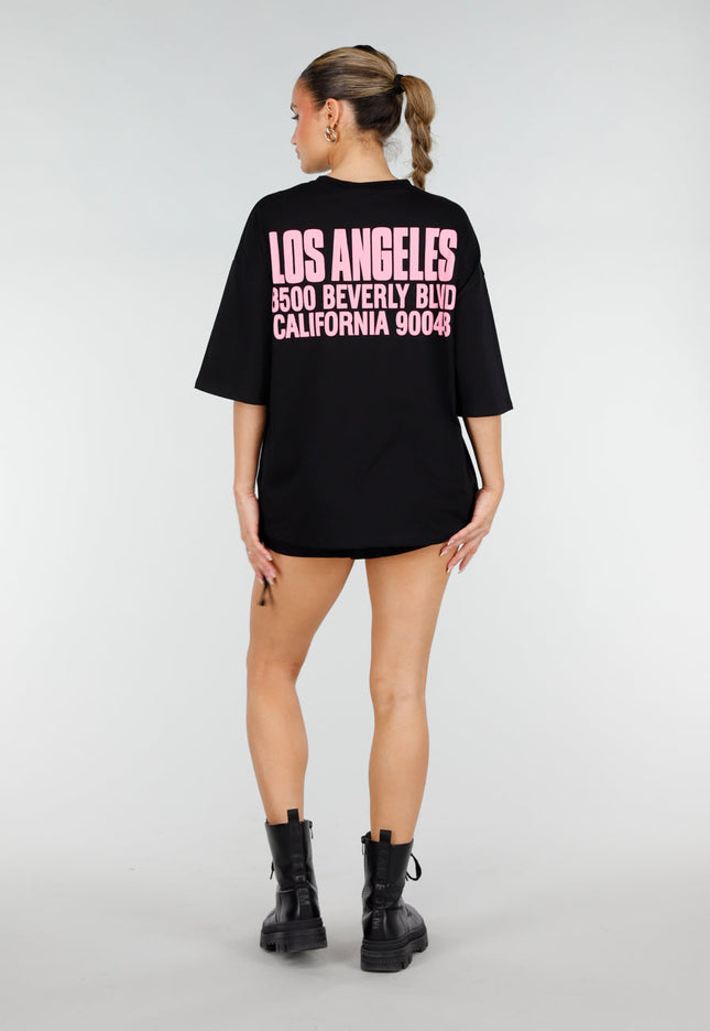NEW290426 Zwart Oversized T-shirt met Roze Tekst