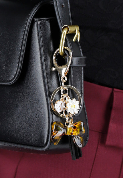 NEW020425 Goudkleurige Tashanger met Leopard Strik