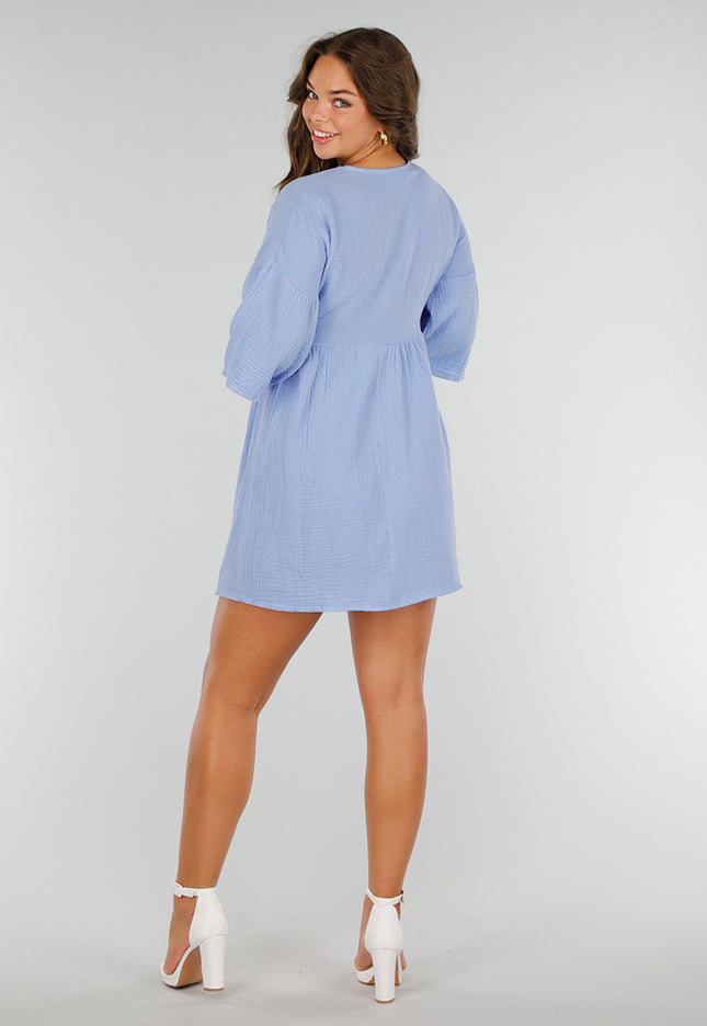 NEW040625 Blauwe jurk met strik en V-hals