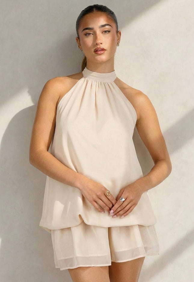 NEW100626 Beige Halter Mini Jurk met Open Rug