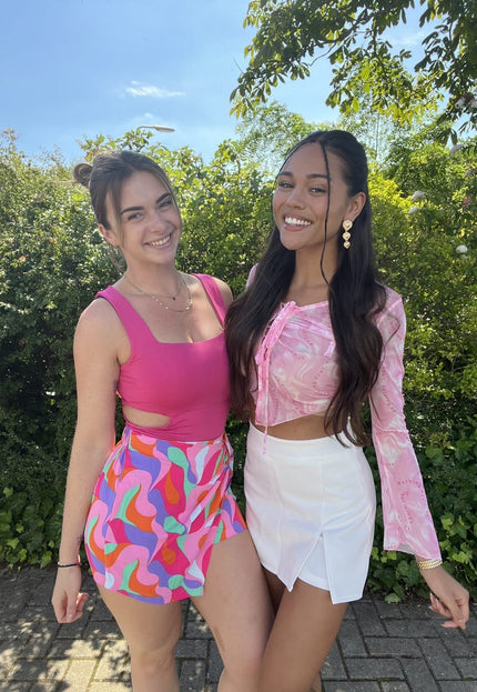 NEW1406 Fuchsia Bodysuit met Open Zij