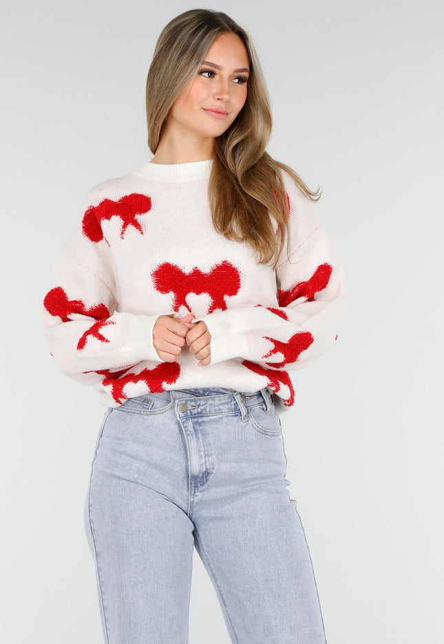 OP=OP.AV.10 Witte Trui met Rode Strikpatronen
