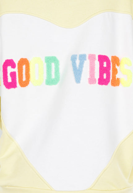 NEW180226 Gele Sweater met Good Vibes Print