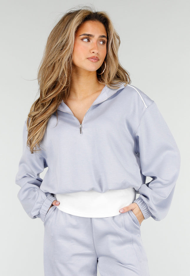 NEW180326 Lichtblauwe Zip Trui met Top