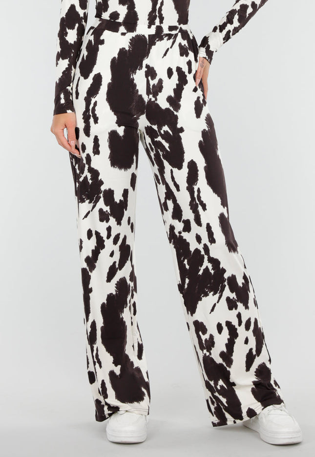 NEW200825 Stretchbroek met Koeienprint
