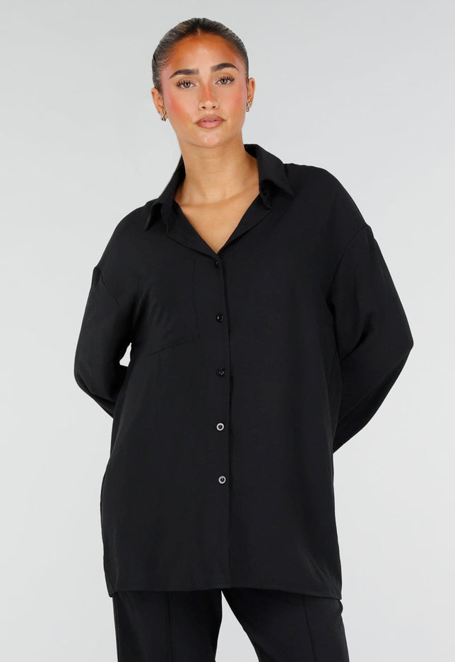 NEW290726 Zwarte Blouse met Kraag en Knoopsluiting
