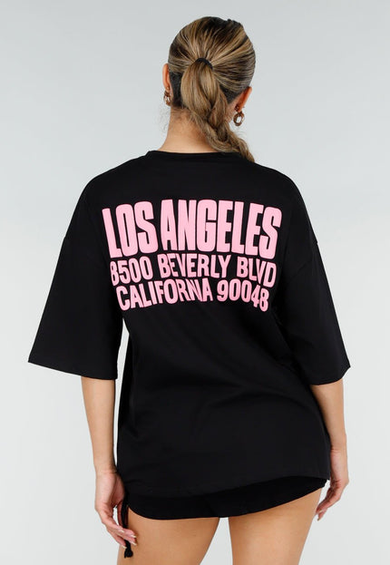 OP=OP.30.NL Zwart Oversized T-shirt met Roze Tekst