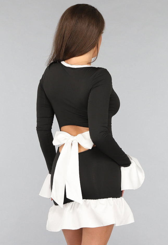 SALE30 Zwarte Drop Waist Jurk met Witte Ruches Details en Strik