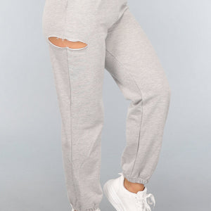 SALE80 Grijze Jogger met Cutout