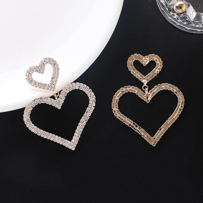 TERUG Gouden Hartjes Oorbellen